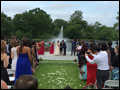 Long Island outdoors wedding ceremony with bride and groom walking down the isle