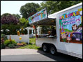 our Long Island food truck for rent decorated with jungle animal themed banners for a little girl's birthday