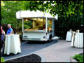 our gourmet food truck parked on a driveway for a graduation party