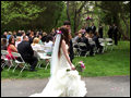 Long Island outdoors wedding ceremony with bride and groom walking down the isle