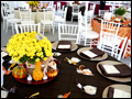 An autumn themed Long Island wedding in Suffolk County, the tables are decorated with mums, pumpkins and gourds