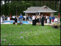 cocktail hour catering at a LI backyard wedding with passed appetizers, open bar and a sushi station